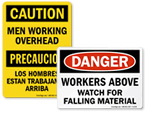 Men Working Above Signs