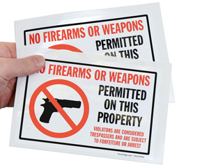 No Firearms Or Weapons Permitted On This Property Sign