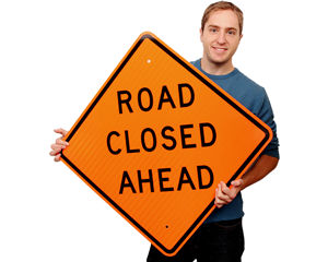 Road closed ahead sign