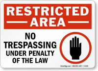Restricted Area No Trespassing Under Penalty Sign